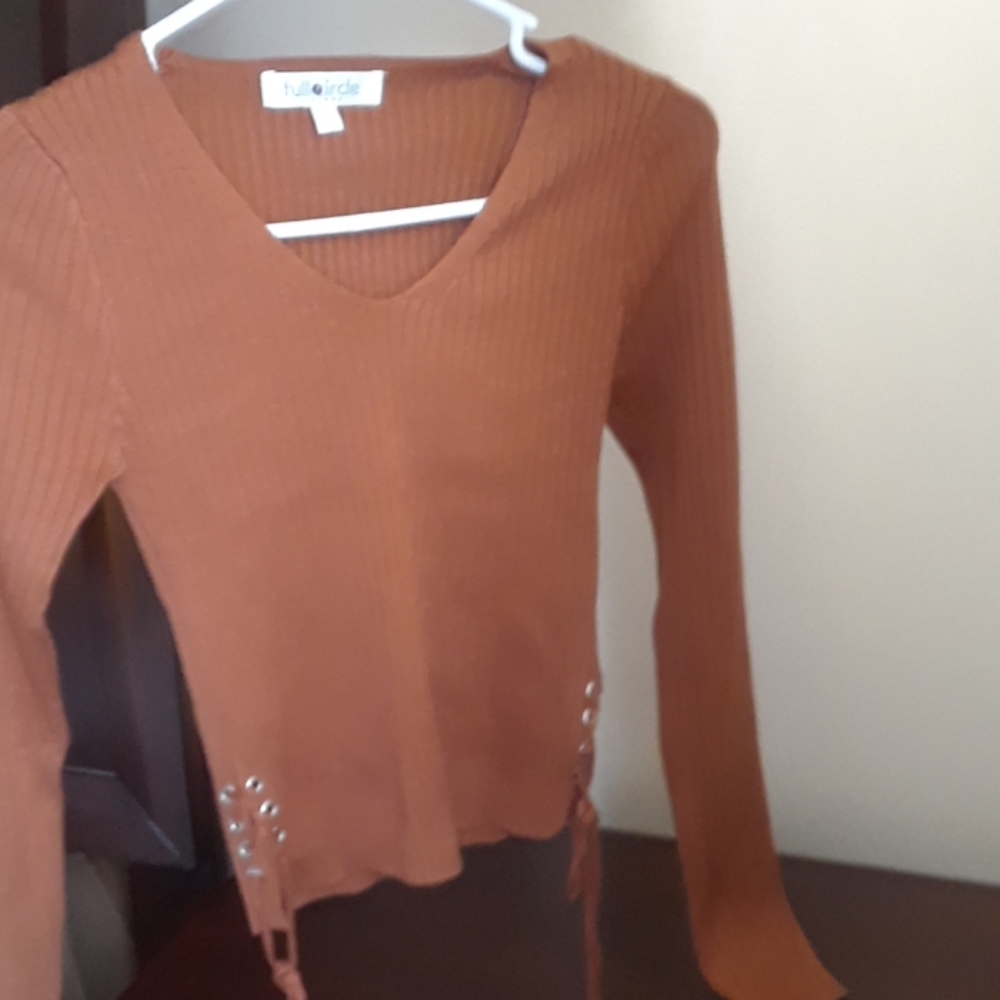 Cute rust sweater with side ties